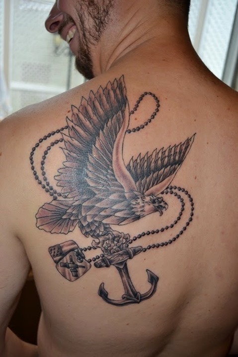 Small Grey Flying Eagle Tattoo On Back